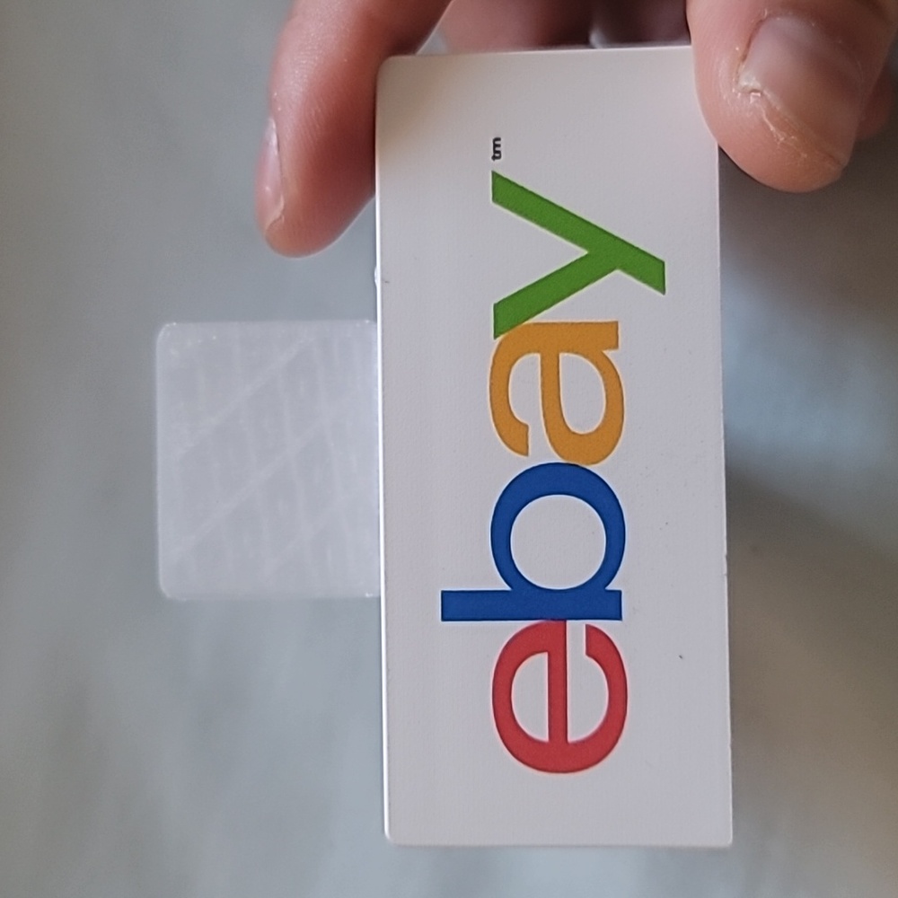 Ebay Logo White Phone Stand